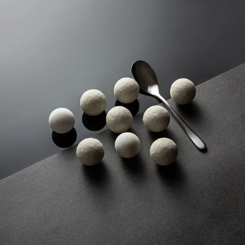 Round spherical brown alumina ball tumbling media from WEYTRUST factory for ferrous metal coarse polishing.