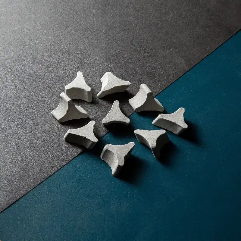 WEYTRUST slant tri-star brown fused alumina tumbling media, designed for irregular workpiece deep deburring in vibratory finishing